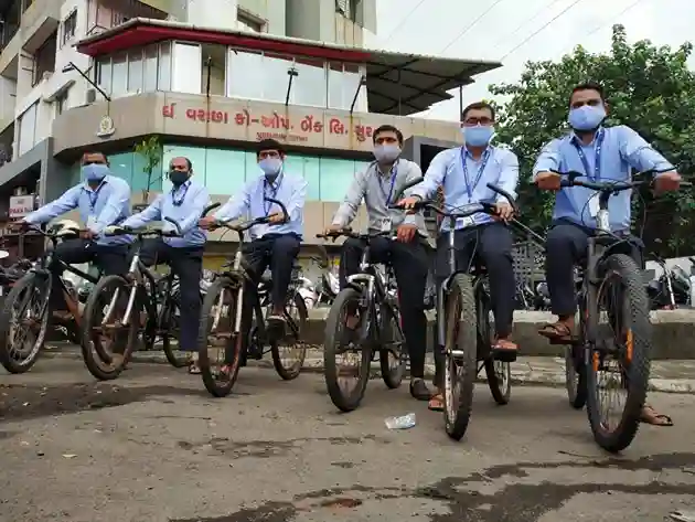 This Surat bank giving bicycle allowance of Rs.500 per month to the employees who come with bicycles for the last two years.